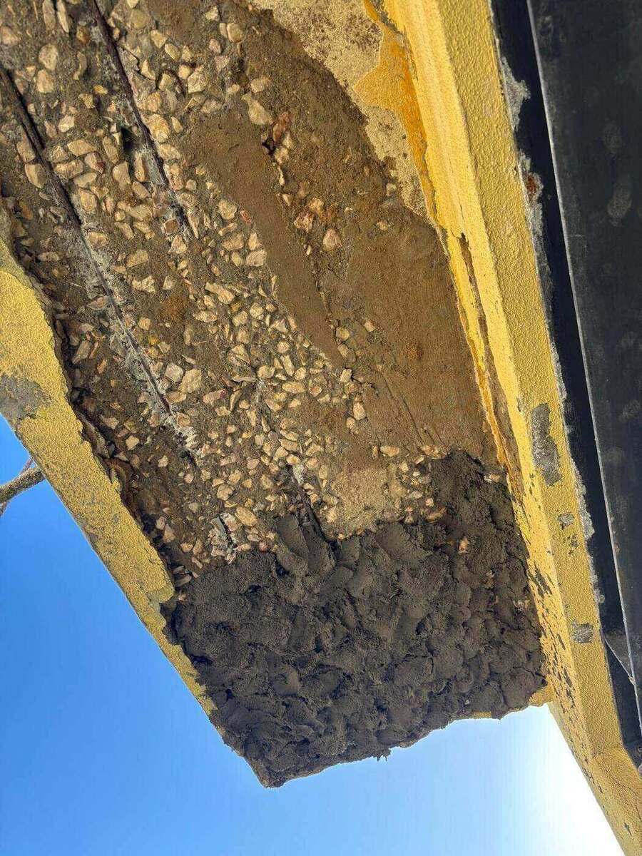 Reparação de betão armado na base de uma laje por acesso por corda: Lisboa